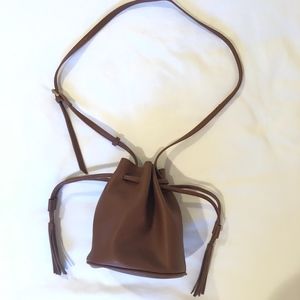 Faux Leather Bucket Bag with Tassels